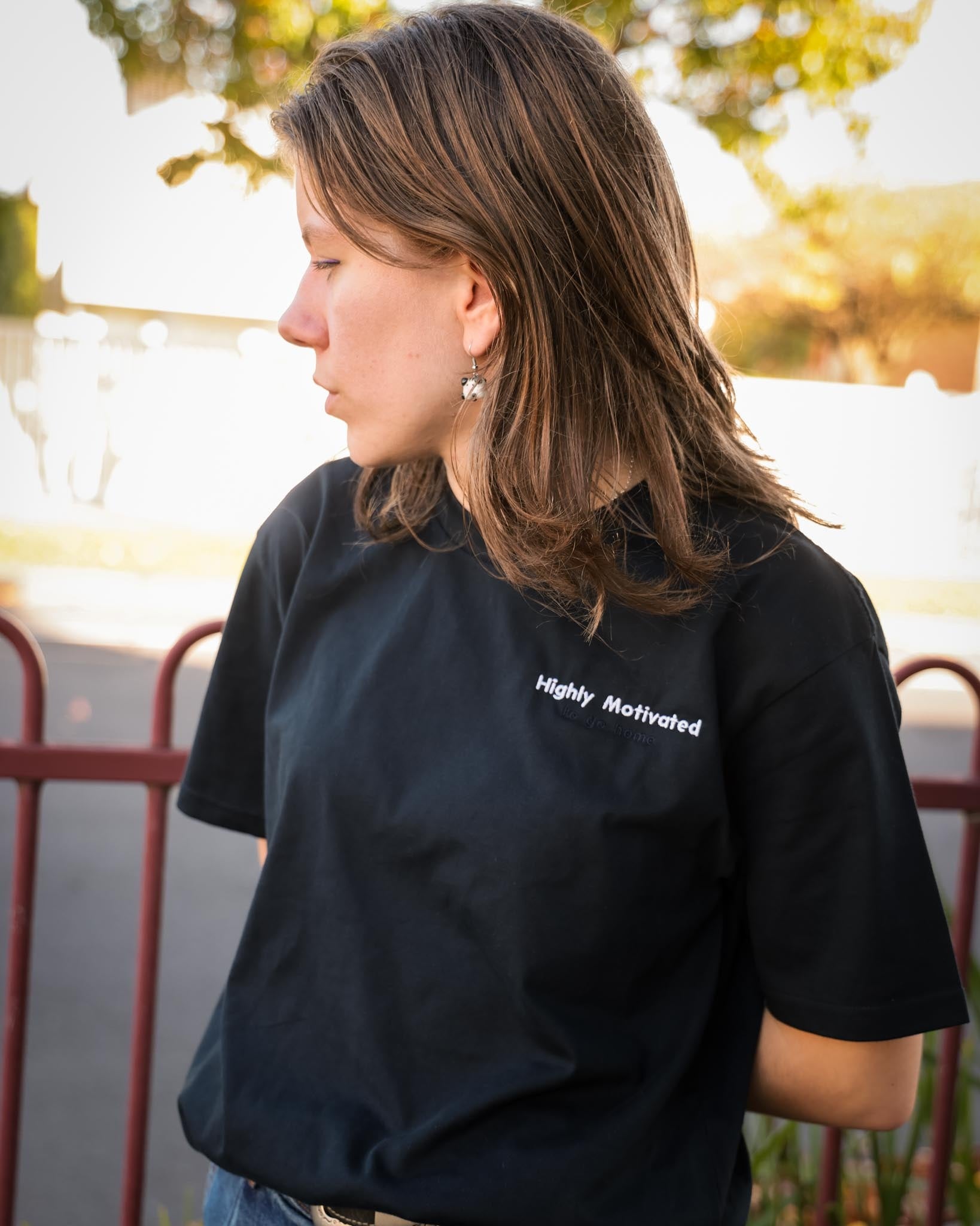 Highly Motivated To Go Home embroidered tee